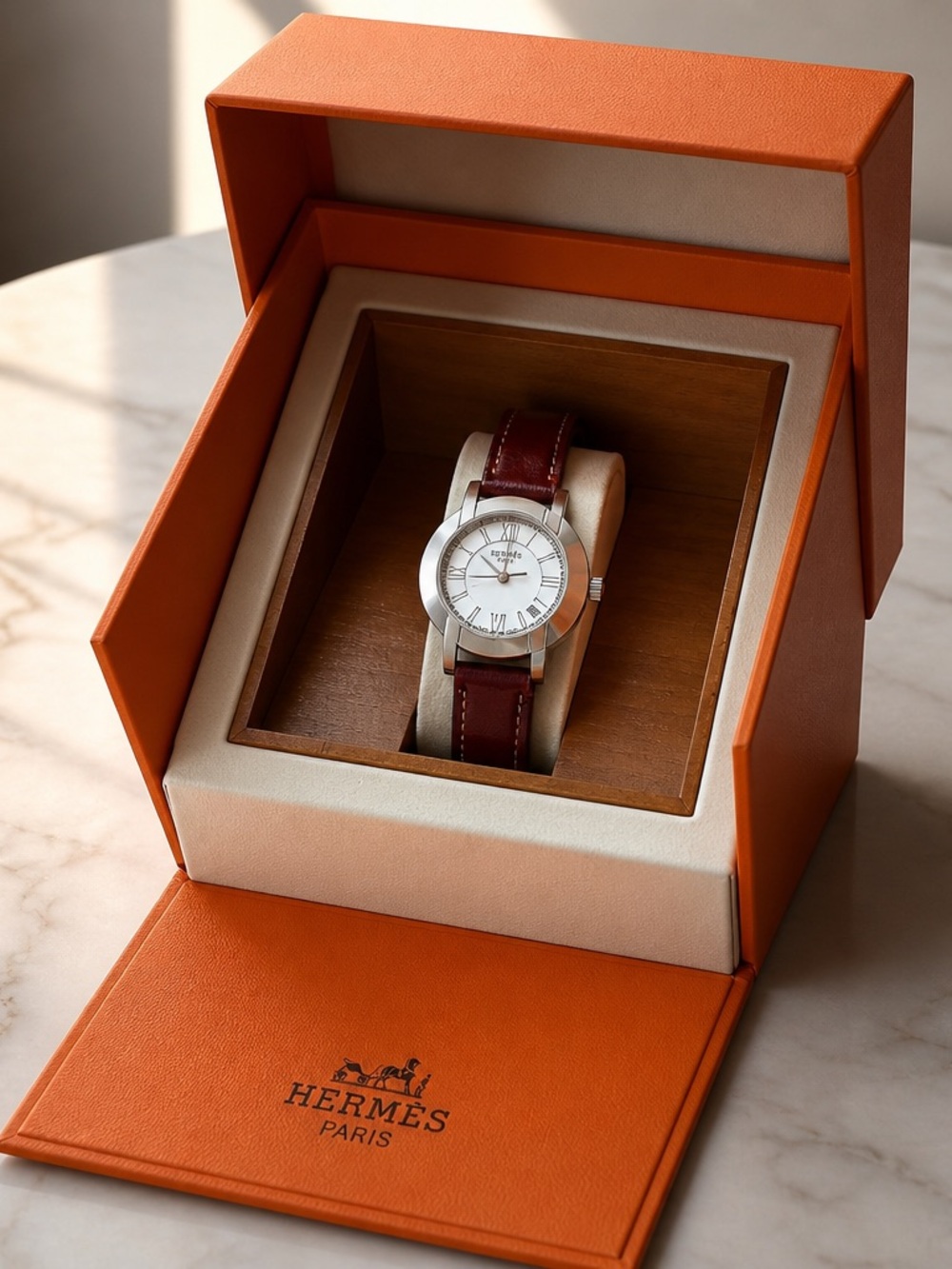 Hermès Silver Dial Women's Watch with Brown Leather Strap